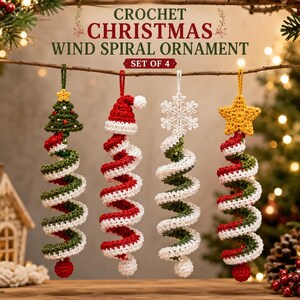 May include: A set of four crochet Christmas wind spiral ornaments hanging from a branch. The ornaments feature a green tree with a yellow star, a red Santa hat, a white snowflake, and a yellow star, all with red, white, and green spiral bodies.
