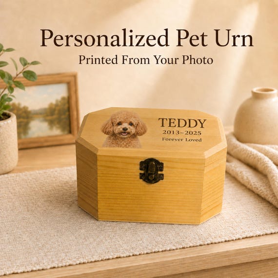 A custom photo-engraved pet urn that treats a small pet's loss with real dignity — genuinely thoughtful, personalized, and something mass retail doesn't do well.