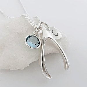 Sterlingzilveren draagbeenketting Draagbeenhanger Gelukshanger met 2 kleine bedels. Ketting kiezen: