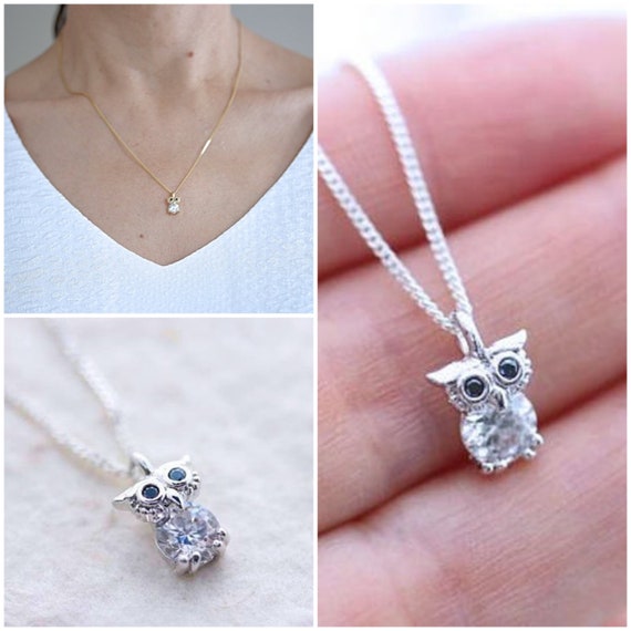 Sterling silver .925 small OWL set CZ pendant with 18" necklace Rhodium finish Sterling silver .925 small OWL set CZ pendant with 18" necklace Rhodium finish