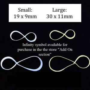 May include: Silver and gold-toned infinity symbol charms. Small size measures 19 x 9mm and large size measures 30 x 11mm. The text reads: Small: 19 x 9mm Large: 30 x 11mm Infinity symbol available for purchase in the the store "Add On section"