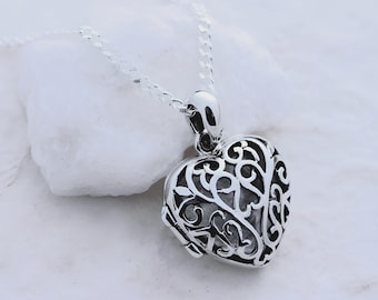 Sterling Silver Heart lockets, solid Sterling Silver knot Locket necklace, Silver locket necklace. 20 L x 15 W x 10mm T. Ref- 38