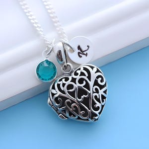Solid sterling silver Heart locket necklace Locket personalized with Initial and Birthstone. Sze: 18m L x 18m W x 9mm T. R-38. Choose chain