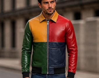 May include: A color-blocked leather jacket featuring a mustard yellow upper left panel, a red upper right panel, a green lower left panel, and a navy blue lower right panel. The jacket has a silver front zipper, a collar, and black ribbed cuffs.