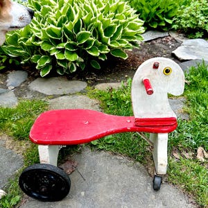Vintage red white horse riding toy handmade caster wheels folk art hand painted Childs toy