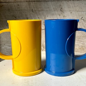 2 Dansk Design Melamine plastic mugs yellow blue Gunnar Cyren Mid Century Modern