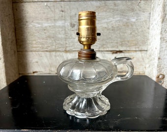 Pressed glass boudoir lamp - clear glass  oil lamp converted to an electric lamp - small lamp