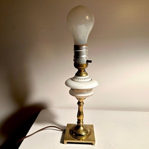 Small milk glass boudoir lamp gold details brass base
