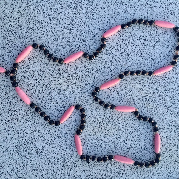 20s pink and black glass beads - round black beads -  oblong pink beads - knotted between beadsnecklace