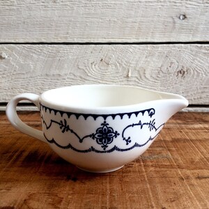 Blue and white china creamer - handle - pitcher - blue glaze -