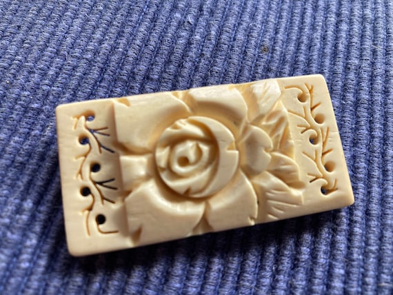 Floral brooch - carved bone rectangular - cutouts… - image 1