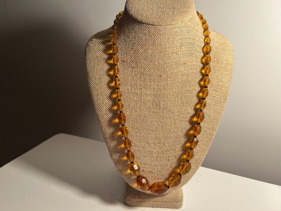Glass faceted necklace graduated beads deep golden color cut glass 25” long