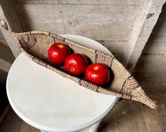 African coil basket primitive basket long basket sisal