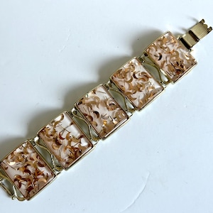 Jaren 60 Lucite gouden confetti schakelarmband - gesigneerd PAM - witte lucite met gouden vlekjes - 5 rechthoekige schakels