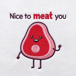 May include: An embroidered design on white fabric featuring a cartoon steak character with a red center, pink edges, and dark purple outlines. The character has a smiling face, thin arms, and legs. The text "Nice to meat you" is embroidered above.