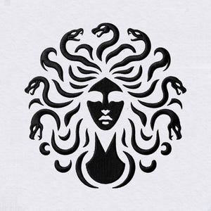 May include: A black embroidered design on a white fabric background featuring a stylized face surrounded by multiple snake-like forms radiating outward in a circular pattern, creating a symmetrical and detailed graphic representation.