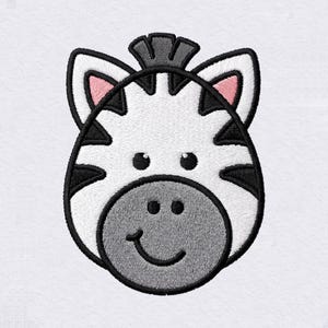 May include: An embroidered patch featuring the head of a zebra with white fur, black stripes, a gray muzzle, and small pink inner ears. The design includes a black outline, two black eyes, two black nostrils, and a curved black line for a mouth.