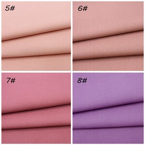 May include: A grid of four fabric swatches featuring a diagonal twill weave. The top left swatch is labeled 5# and is light pink. The top right swatch is labeled 6# and is dusty rose. The bottom left is 7# in mauve, and bottom right is 8# in lavender.