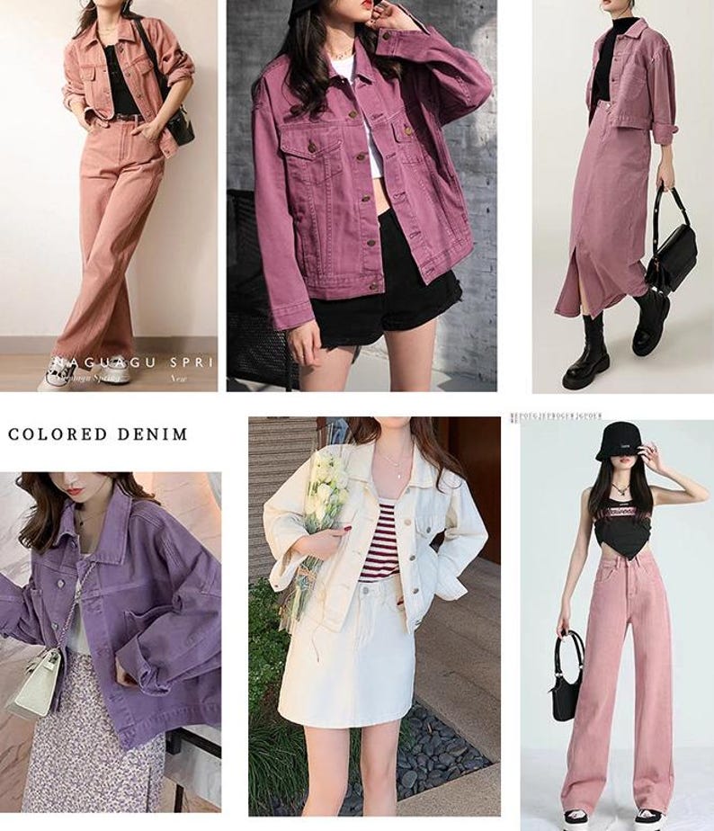 May include: A collection of colored denim jackets and matching bottoms in various shades including pink, purple, and white. The garments feature button-down closures, collars, and pockets, showcasing a variety of outfits with denim fabric.