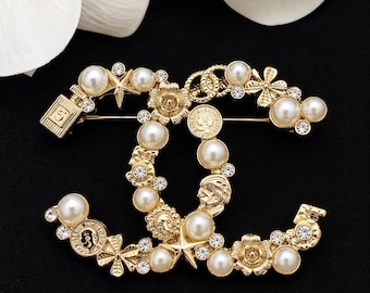 Vintage Chanel Gold Tone CC Logo Pearl Crystal Floral Charm Brooch Pin