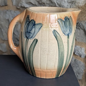 Roseville pottery tulip pattern water pitcher 1900s