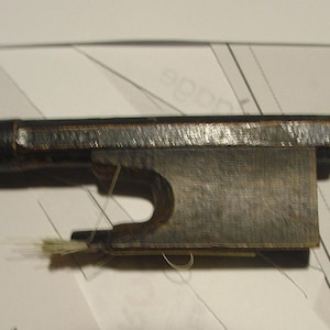 Old violin bow to restore rehair