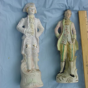 Vintage bisque statues in 18th century dress