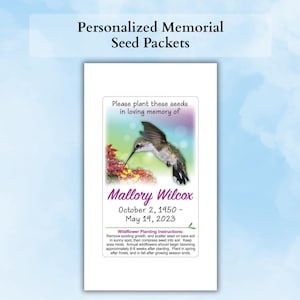 May include: A rectangular memorial seed packet featuring a hummingbird hovering over red flowers. The text reads: Please plant these seeds in loving memory of, Mallory Wilcox, October 2, 1950 - May 19, 2023, and Wildflower Planting Instructions.
