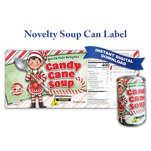 May include: A novelty soup can label featuring a cartoon elf holding a spoon, with the text North Pole Delights Candy Cane Soup 2026 Edition. The design includes a nutrition facts panel, a Santa Approved stamp, and a caution warning label.