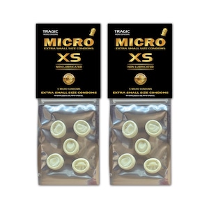May include: Two identical black and gold packages of Tragic Micro extra small size non-lubricated condoms. Each package features the text Micro, XS, and contains five small, off-white, rolled latex items visible through a clear plastic pouch.
