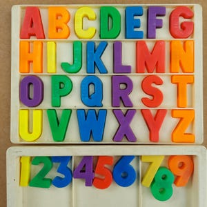 Fisher-price magnetiskt alfabet Bokstäver Siffror Små människor Lekfamilj 1970-talet