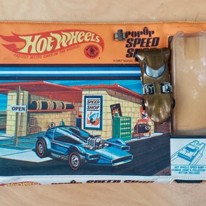 Hot Wheels Redline pop up speed shop with twin mill car Mattel 1968