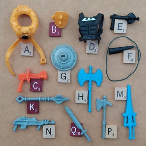 MOTU He-man - Piezas originales, paquete de armas y accesorios de Mattel (1983)