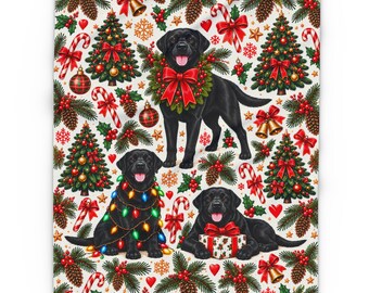 May include: A white blanket featuring a repeating Christmas pattern of black Labrador dogs, decorated Christmas trees, candy canes, pinecones, red bows, holly berries, and gold bells. The dogs are shown with wreaths, string lights, and gifts.