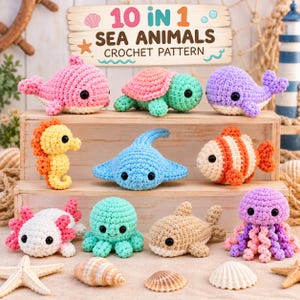May include: A collection of ten crocheted sea animal toys including a pink whale, a green turtle, a purple whale, a yellow seahorse, a blue stingray, an orange fish, a white axolotl, a green octopus, a tan shark, and a purple jellyfish.