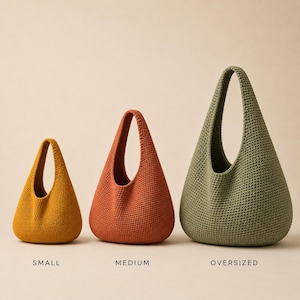 May include: Three crochet hobo bags in varying sizes and colours. The small bag is mustard yellow, the medium bag is burnt orange, and the oversized bag is sage green. Each bag features a single integrated handle and a textured knit construction.