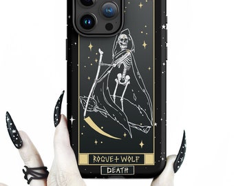 May include: Black phone case with a tarot card design featuring a skeleton holding a scythe. The card is titled "Death" and the case has a gold trim. The case is designed by Rogue + Wolf.