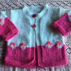 Hand-knitted Rose and White flower cardigan.