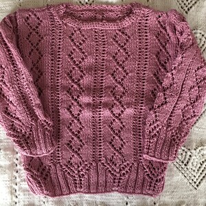 Hand-knitted Amethyst Lace sweater.