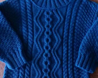 Blue Aran sweater.