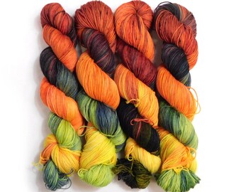 RAMMSKEINS: Till        100g Variegated Yellow Orange Black Sock Yarn   Fluorescent/UV Reactive