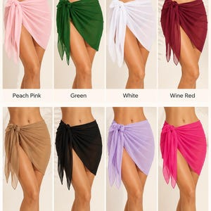 May include: A collection of eight sheer sarong skirts in various colors including peach pink, green, white, wine red, beige, black, lavender, and hot pink. Each skirt features a side-tie knot detail, a semi-transparent fabric, and a short hemline.