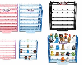 May include: A collection of Ooshies display stands in pink, blue, and black, each featuring five horizontal shelves with small pegs for holding miniature figures. One blue stand is populated with various colourful character figurines.