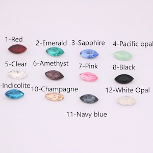 Puede incluir: Doce colores diferentes de piedras de imitaci&oacute;n en forma de marquesa, incluyendo rojo, verde esmeralda, azul zafiro, &oacute;palo pac&iacute;fico, transparente, amatista, rosa, negro, azul indicolita, champ&aacute;n, azul marino y &oacute;palo blanco.