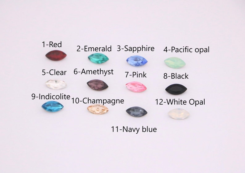 Puede incluir: Doce colores diferentes de piedras de imitaci&oacute;n en forma de marquesa, incluyendo rojo, verde esmeralda, azul zafiro, &oacute;palo pac&iacute;fico, transparente, amatista, rosa, negro, azul indicolita, champ&aacute;n, azul marino y &oacute;palo blanco.