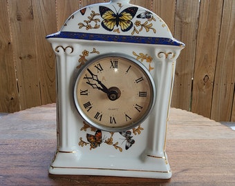 formalities by baum bros vintage clock