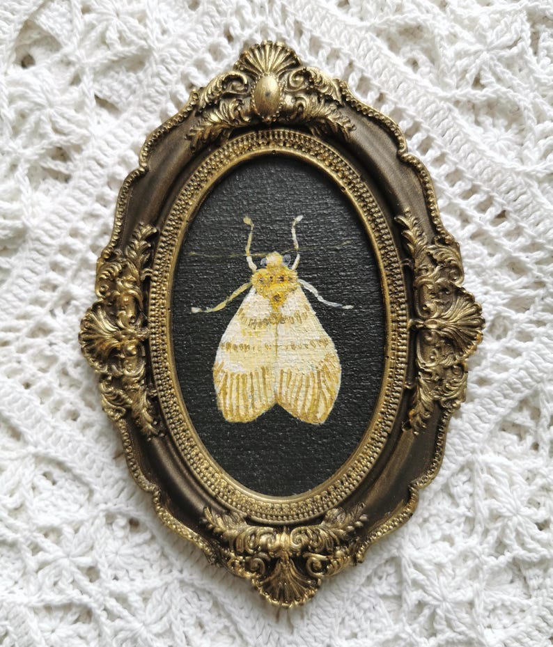 Small handmade moth plaque painted with acrylics on plywood for gothic and nature-inspired home decor.
