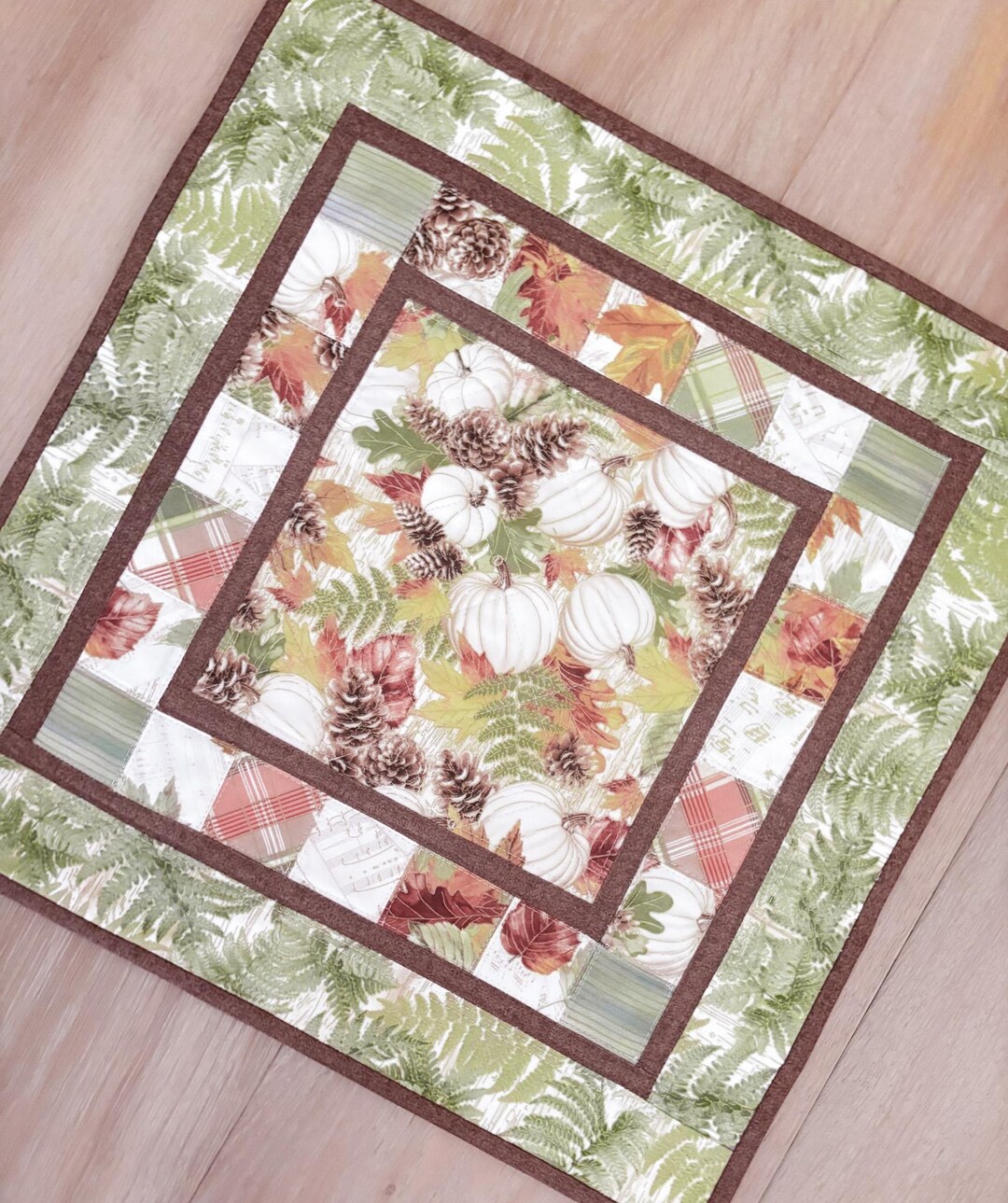 Pumpkin Charm Quilted Table Topper NCU0DDK597