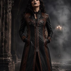 Long structured leather coat with contrasting panels, metal studs and side buckles