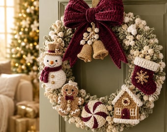 May include: A round Christmas wreath made of textured cream and green yarn, featuring a large dark red velvet-style bow at the top with two gold bells. Attached are crocheted ornaments: a snowman, a gingerbread person, a peppermint, a house, and a stocking.
